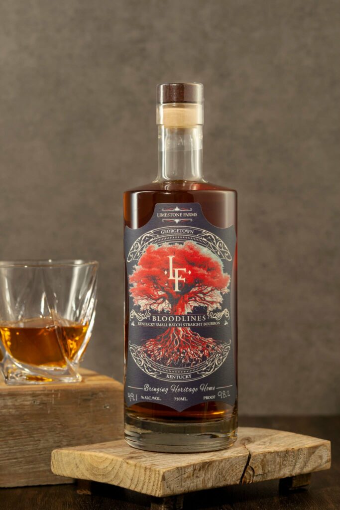 LF Heritage Distilling Bloodlines Small Batch bourbon bottle with tasting glass